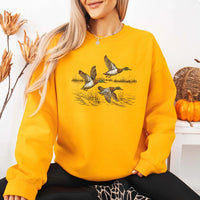 May include Wild Mallard Ducks sweatshirt with mallard duck graphic, classic unisex crewneck, long sleeves, and soft fleece fabric