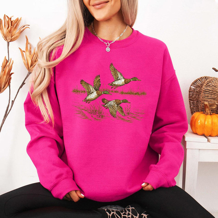 May include Wild Mallard Ducks sweatshirt with mallard duck graphic, classic unisex crewneck, long sleeves, and soft fleece fabric