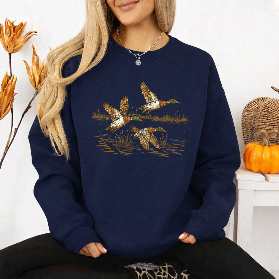May include Wild Mallard Ducks sweatshirt with mallard duck graphic, classic unisex crewneck, long sleeves, and soft fleece fabric