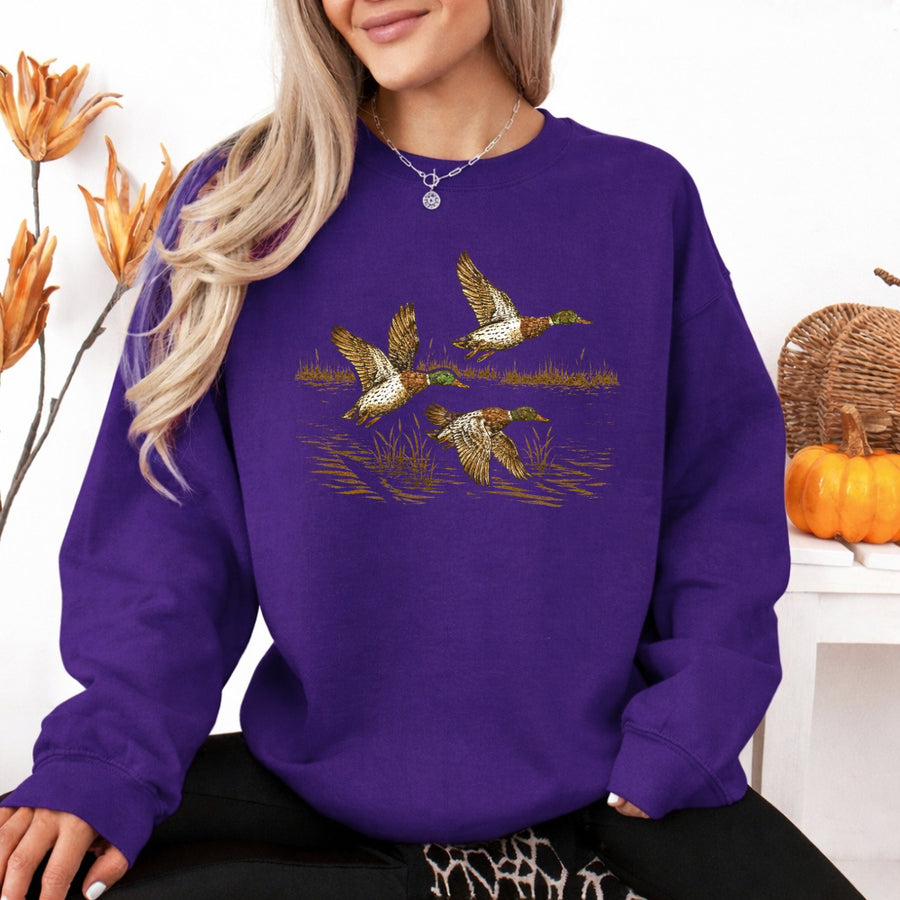 May include Wild Mallard Ducks sweatshirt with mallard duck graphic, classic unisex crewneck, long sleeves, and soft fleece fabric