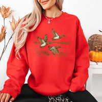 May include Wild Mallard Ducks sweatshirt with mallard duck graphic, classic unisex crewneck, long sleeves, and soft fleece fabric