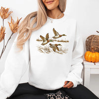 May include Wild Mallard Ducks sweatshirt with mallard duck graphic, classic unisex crewneck, long sleeves, and soft fleece fabric