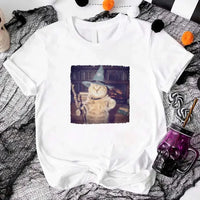 May include a Halloween t-shirt with a funny wizard cat meme graphic, combining magical and spooky design elements for cat lovers.