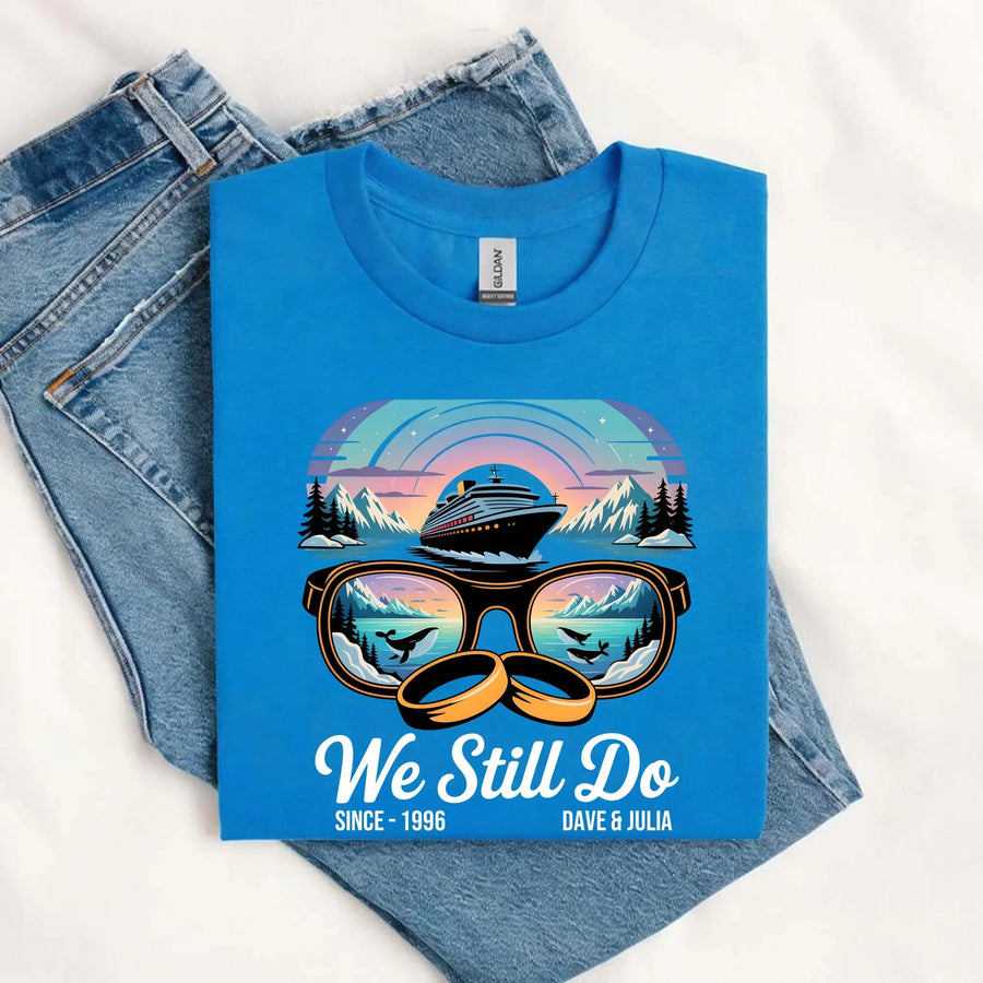 Blue Alaska adventure anniversary t-shirt with sunglasses, cruise ship, mountains, and whales graphic