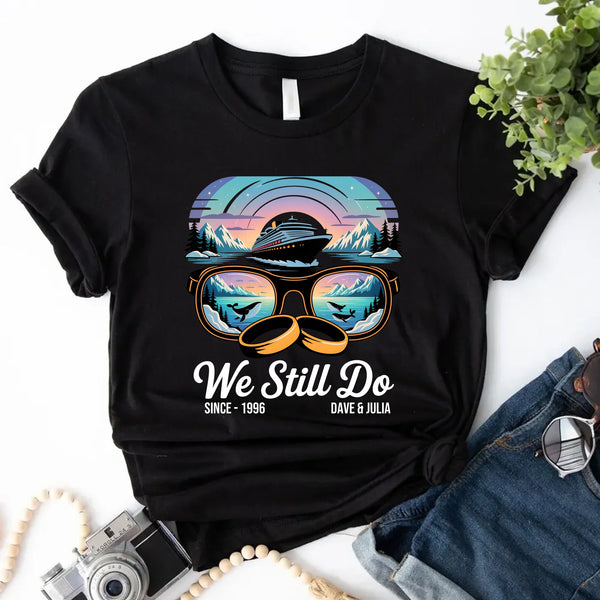 May include a personalized couple’s t-shirt with the phrase “Alaska Adventure We Still Do,” featuring travel-themed graphics, perfect for anniversaries and outdoor-loving partners.