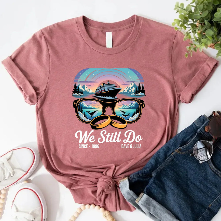 May include a personalized couple’s t-shirt with the phrase “Alaska Adventure We Still Do,” featuring travel-themed graphics, perfect for anniversaries and outdoor-loving partners.