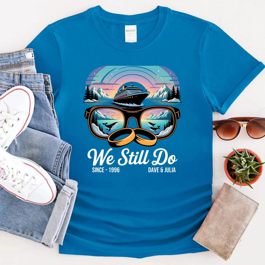 Blue personalized anniversary T-shirt with Alaska cruise print, sunglasses, rings, and custom names.