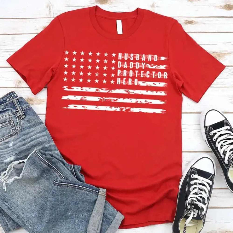 Red patriotic Father's Day t-shirt with US flag graphic and 'Husband Daddy Protector Hero' text