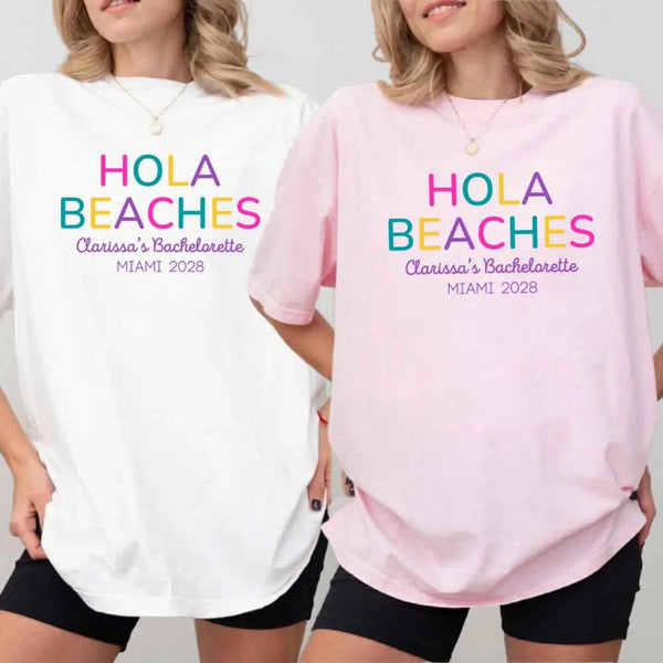 May include colorful “Bride Tribe” beach bachelorette T-shirts worn by a group of women, vibrant summer tones, seaside backdrop, fun party vibe, coordinated bridal crew outfits celebrating together!