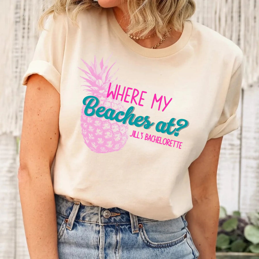 May include Cream personalized Where My Beaches At bachelorette party shirt with palm tree design, beach bride squad tee, bridesmaid shirt, tropical girls trip outfit, and bridal celebration top.