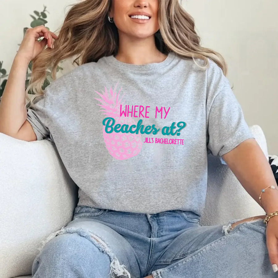 May include Grey personalized Where My Beaches At bachelorette party shirt with palm tree design, beach bride squad tee, bridesmaid shirt, tropical girls trip outfit, and bridal celebration top.