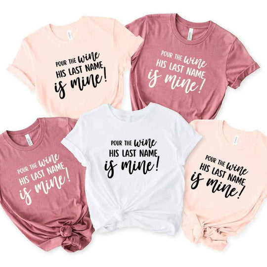 May include Bachelorette Party Shirt with "Pour The Wine His Last Name Is Mine" T-Shirt design, perfect for bridal celebrations, fun nights, and making a statement!
