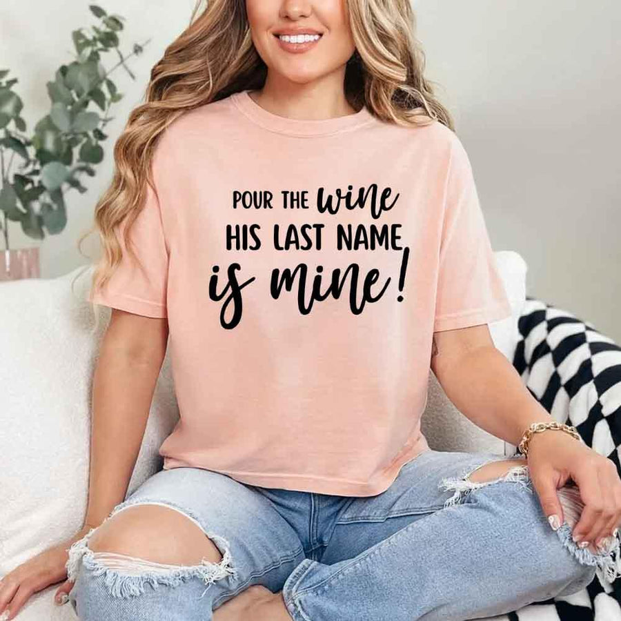 May include Peach Bachelorette Party Shirt with "Pour The Wine His Last Name Is Mine" T-Shirt design, perfect for bridal celebrations, fun nights, and making a statement!
