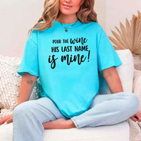 May include Turquoise Bachelorette Party Shirt with "Pour The Wine His Last Name Is Mine" T-Shirt design, perfect for bridal celebrations, fun nights, and making a statement!
