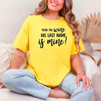May include Daisy Bachelorette Party Shirt with "Pour The Wine His Last Name Is Mine" T-Shirt design, perfect for bridal celebrations, fun nights, and making a statement!
