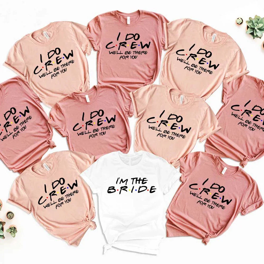 Collection of t-shirts with 'I DO CREW' and 'I'm the Bride' text on a white background.