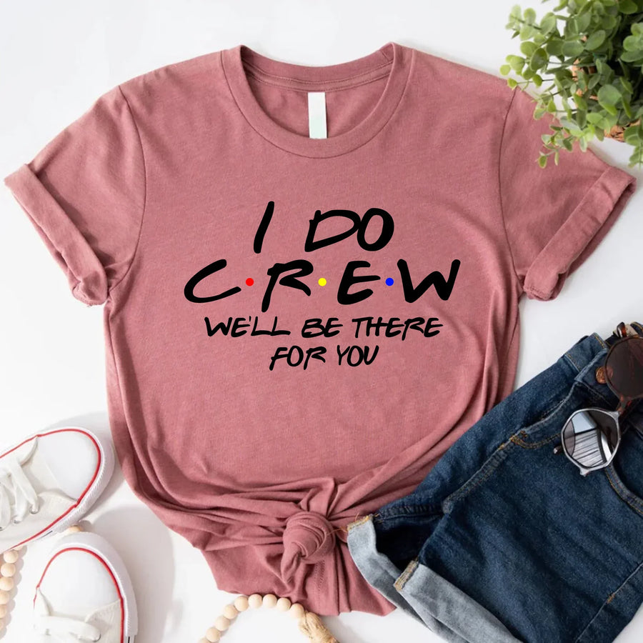 Dusty rose graphic T-shirt reading “I do crew, we’ll be there for you