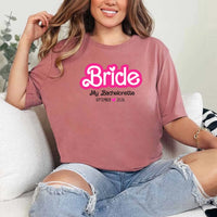 May include Mauve, a custom design for a Bachelorette Party T-Shirt, featuring personalized text and vibrant colors, ideal for bridal party shirts.