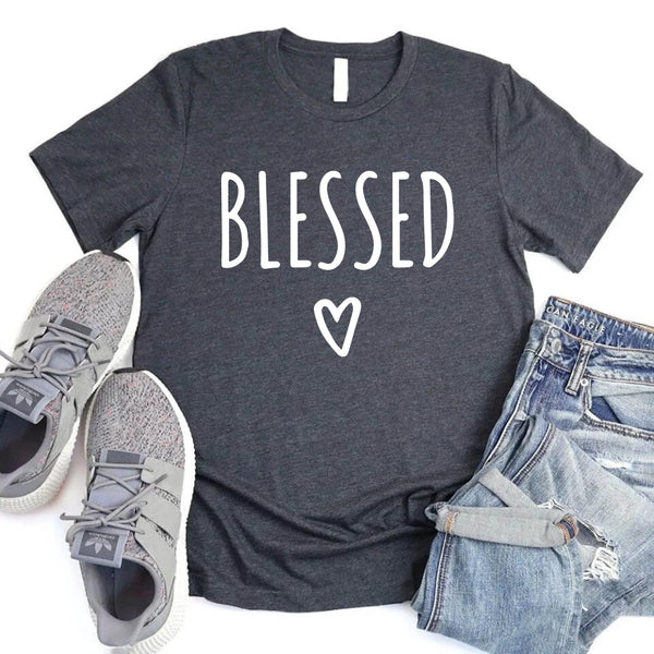 May include parent and child wearing a dark heather Blessed Parent and Mini matching t-shirts.
