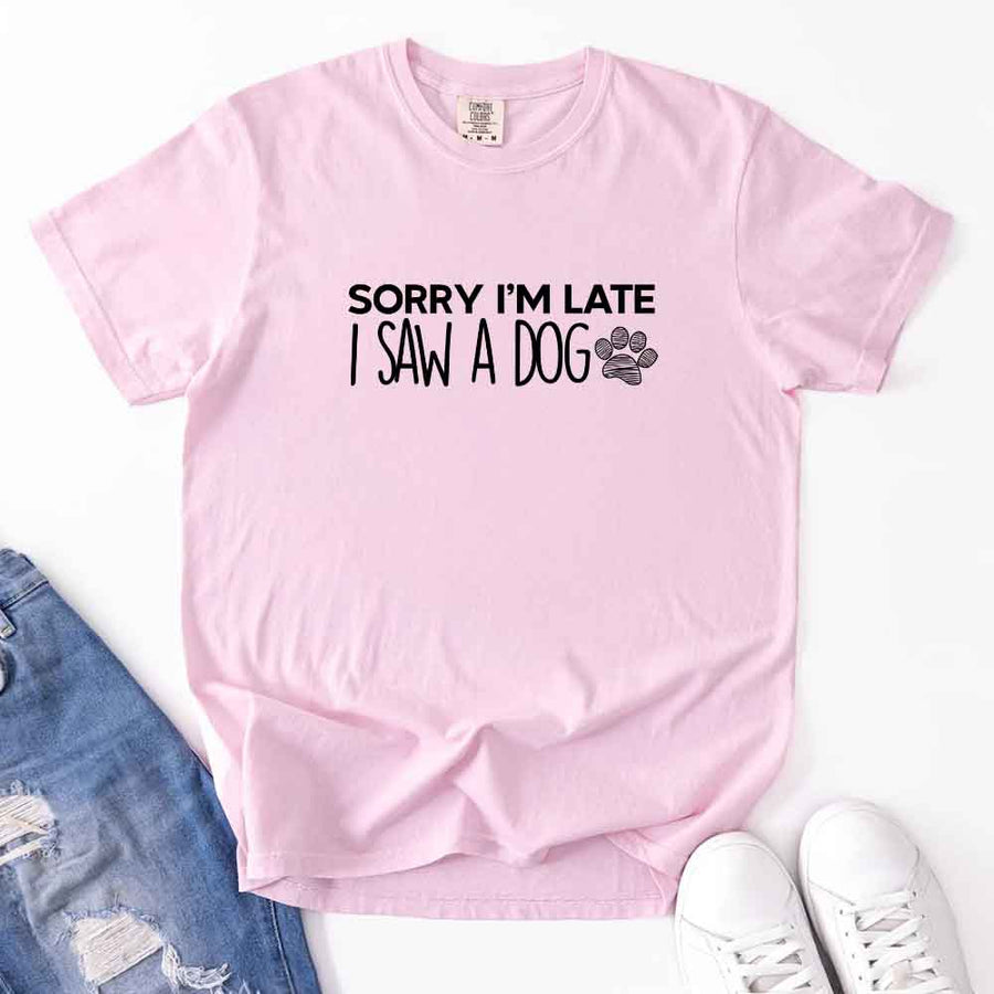 May include a Sorry I'm Late I Saw a Dog Comfort Colors T-Shirt featuring a funny dog lover statement design.