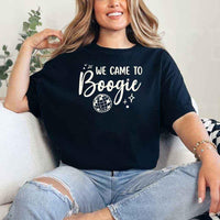 May include a Black retro-style graphic tee with bold disco lettering reading “Boogie With Me, I’m The Bride To Be,” featuring playful fonts and festive design elements!