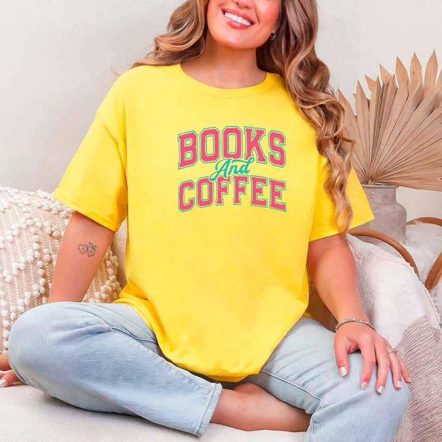 May include a person wearing a Daisy Books & Coffee T-Shirt featuring trendy BookTok reader graphic and relaxed fit.