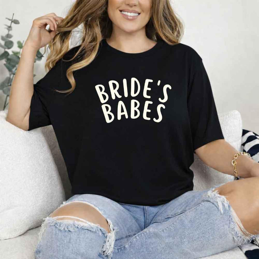 May include Black Bride's Babes Tees for Bridesmaids, showcasing trendy designs perfect for bridal parties and wedding celebrations.