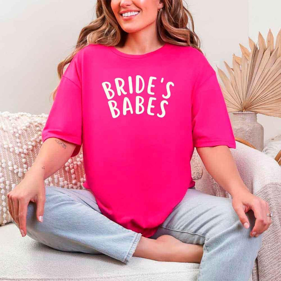 May include Heliconia Bride's Babes Tees for Bridesmaids, showcasing trendy designs perfect for bridal parties and wedding celebrations.