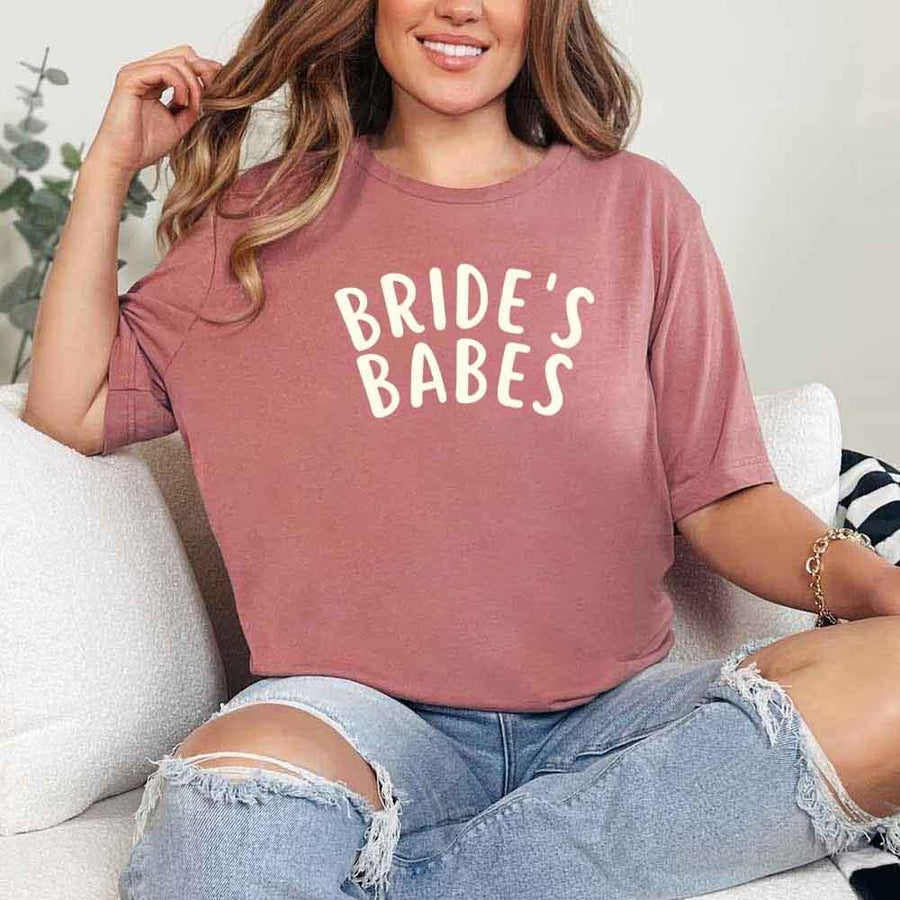May include Mauve Bride's Babes Tees for Bridesmaids, showcasing trendy designs perfect for bridal parties and wedding celebrations.