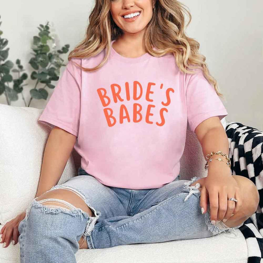 May include Pink Bride's Babes Tees for Bridesmaids, showcasing trendy designs perfect for bridal parties and wedding celebrations.
