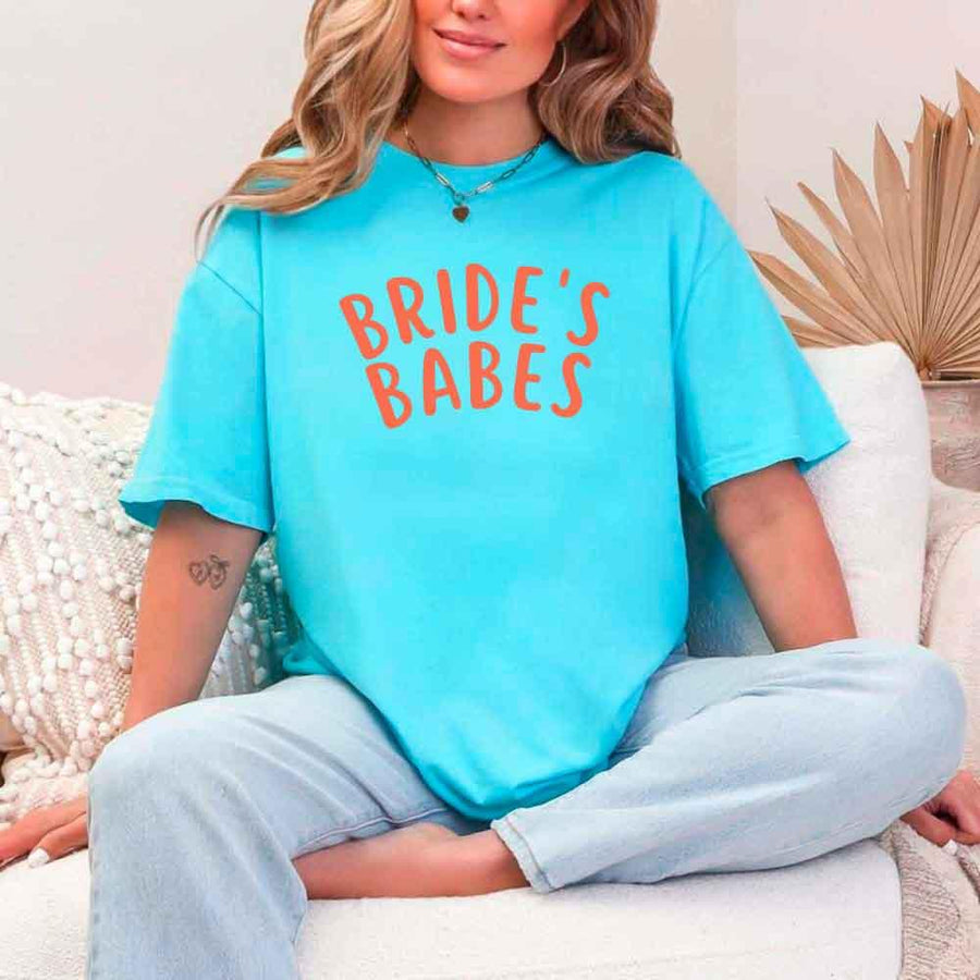 May include Turquoise Bride's Babes Tees for Bridesmaids, showcasing trendy designs perfect for bridal parties and wedding celebrations.