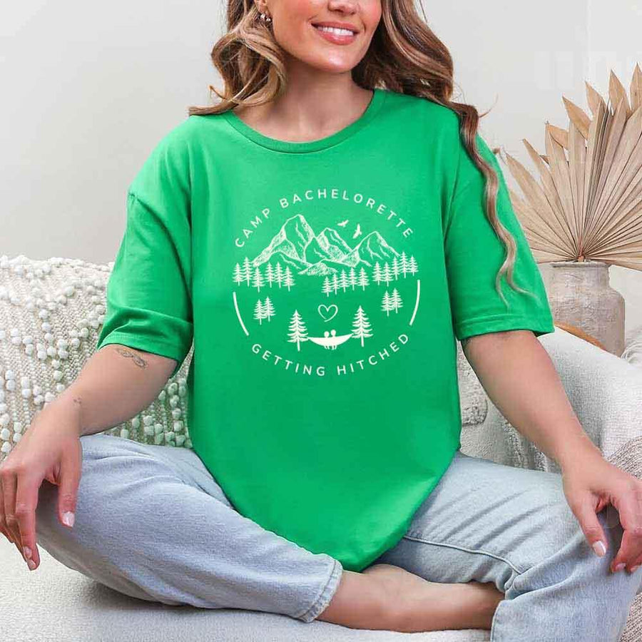 May include Irish Green camp themed Bachelorette t shirts with fun outdoor slogans cozy vibes bridal squad outfits perfect for camping trip celebrations and girls getaway!