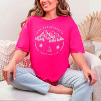 May include Heliconia camp themed Bachelorette t shirts with fun outdoor slogans cozy vibes bridal squad outfits perfect for camping trip celebrations and girls getaway!