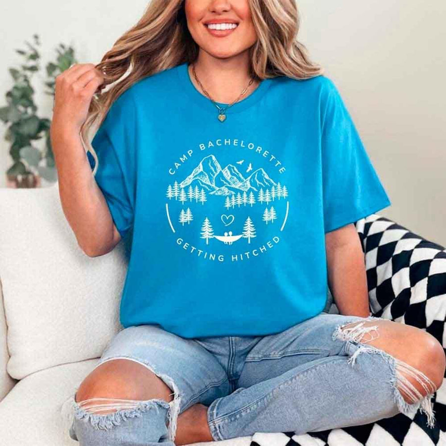 May include Sapphire camp themed Bachelorette t shirts with fun outdoor slogans cozy vibes bridal squad outfits perfect for camping trip celebrations and girls getaway!