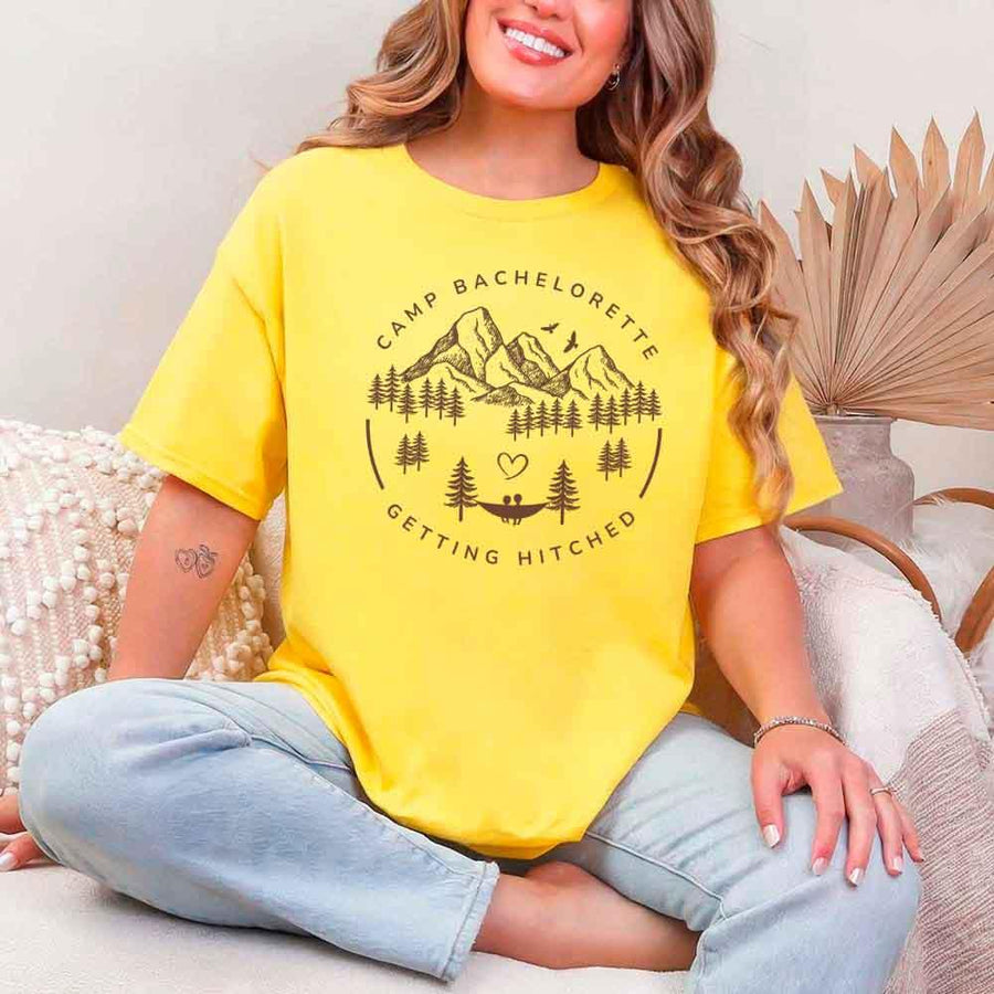 May include Daisy camp themed Bachelorette t shirts with fun outdoor slogans cozy vibes bridal squad outfits perfect for camping trip celebrations and girls getaway!
