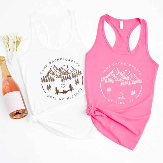 May include a group of women wearing matching camp bachelorette tank tops with fun bridal-themed graphics outdoors.