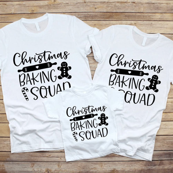 May include a festive holiday t-shirt featuring the phrase “Christmas Baking Squad,” styled with cheerful typography and baking-themed graphics such as cookies, rolling pins, or whisks. The design reflects a fun, team-spirited theme for families or friends who enjoy baking together during the Christmas season.