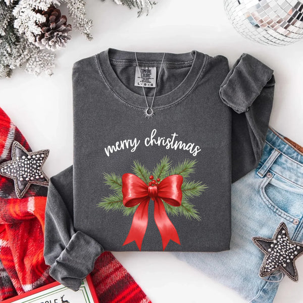 May include a Comfort Colors T-shirt featuring a Christmas bow graphic in coquette aesthetic style with soft vintage tones.