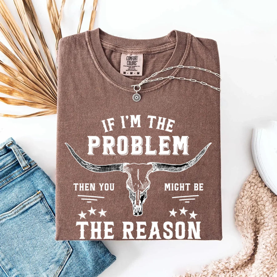 May include a Comfort Colors unisex Western shirt with “If I’m The Problem Then You Might Be The Reason” text, styled with vintage country flair.