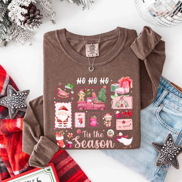 May include a Comfort Colors long sleeve unisex Christmas shirt with “Ho Ho Ho Tis The Season” text design in festive holiday style.