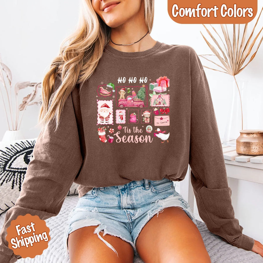 May include a Comfort Colors long sleeve unisex Christmas shirt with “Ho Ho Ho Tis The Season” text design in festive holiday style.