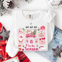 May include a Comfort Colors long sleeve unisex Christmas shirt with “Ho Ho Ho Tis The Season” text design in festive holiday style.