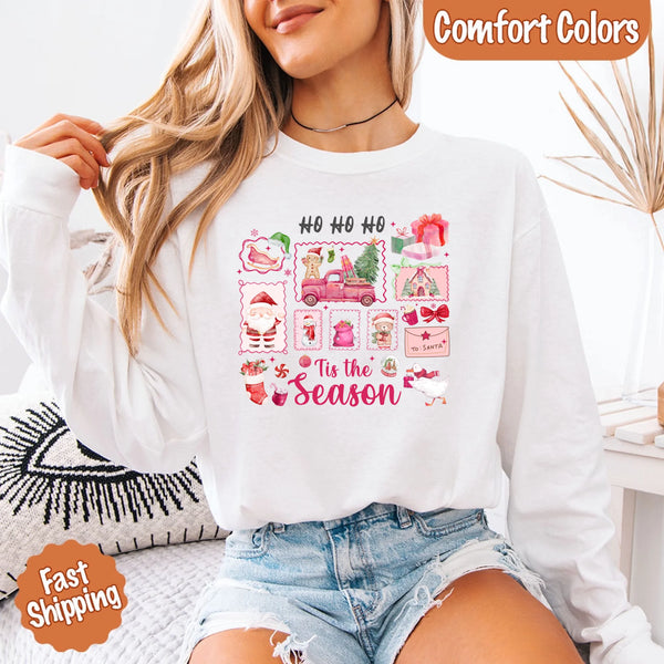 May include a Comfort Colors long sleeve unisex Christmas shirt with “Ho Ho Ho Tis The Season” text design in festive holiday style.