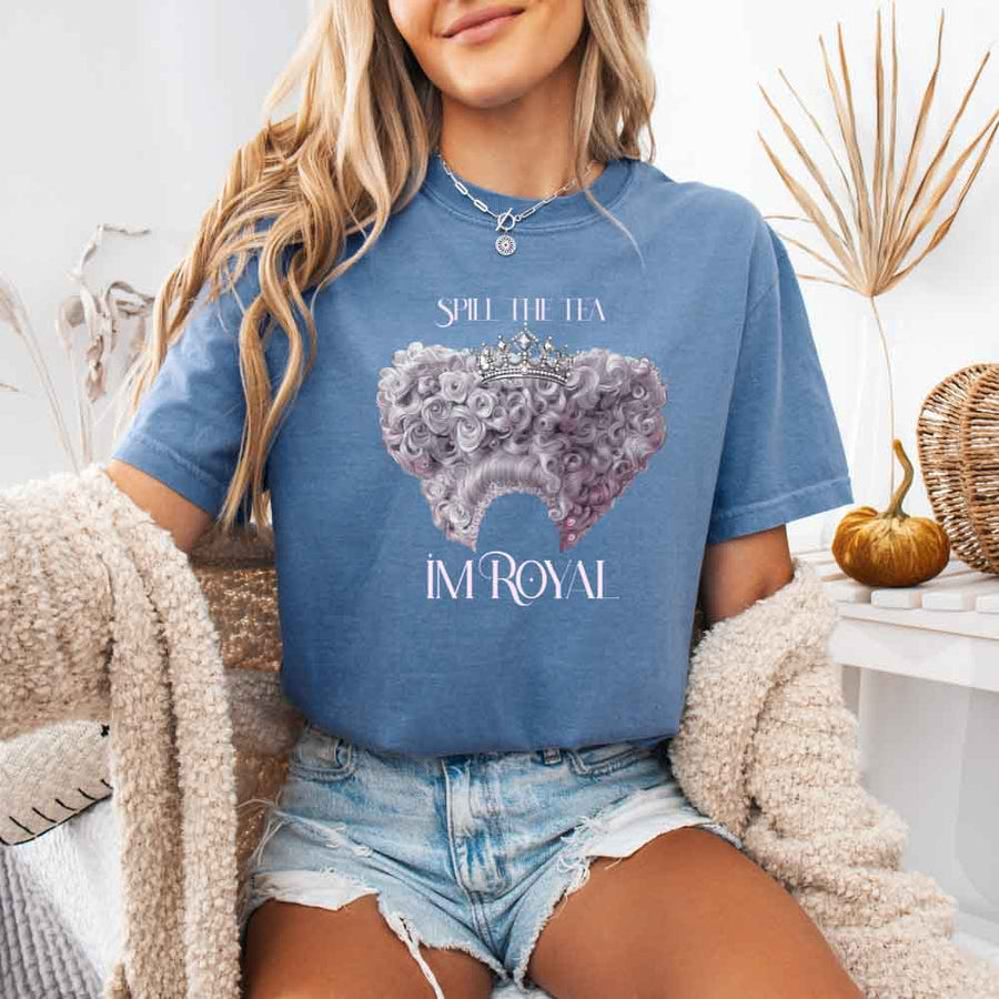 May include a person wearing a Blue Jean Comfort Colors Spill the Tea I’m Royal T-Shirt featuring regency gossip inspired graphic and relaxed fit.