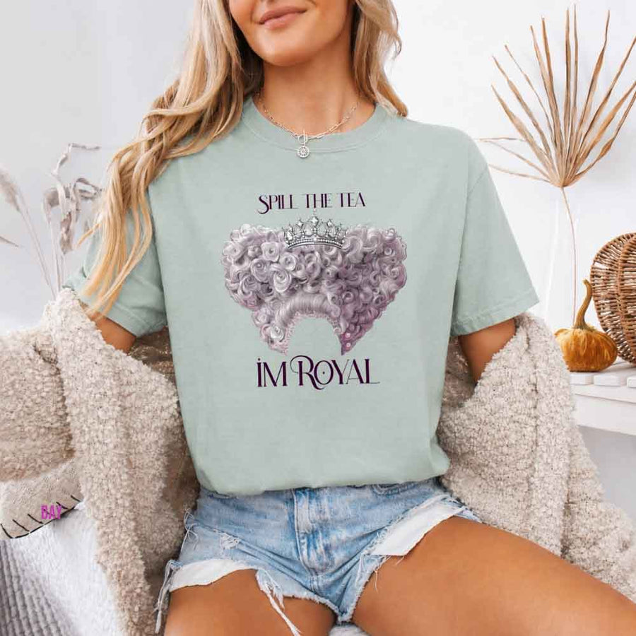 May include a person wearing a Bay Comfort Colors Spill the Tea I’m Royal T-Shirt featuring regency gossip inspired graphic and relaxed fit.