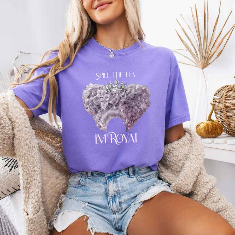 May include a person wearing a Violet Comfort Colors Spill the Tea I’m Royal T-Shirt featuring regency gossip inspired graphic and relaxed fit.