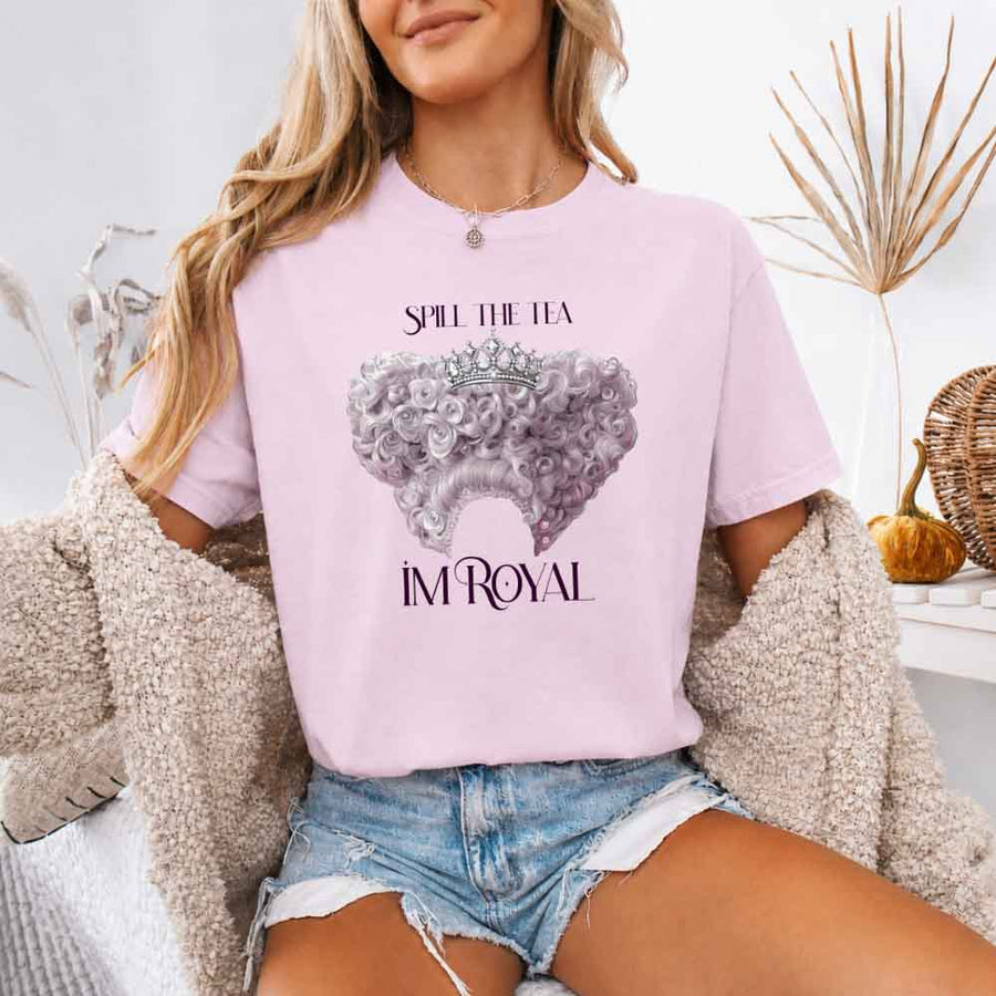 May include a person wearing a Blossom Comfort Colors Spill the Tea I’m Royal T-Shirt featuring regency gossip inspired graphic and relaxed fit.