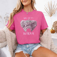 May include a person wearing a Crunchberry Comfort Colors Spill the Tea I’m Royal T-Shirt featuring regency gossip inspired graphic and relaxed fit.
