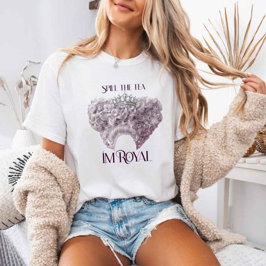 May include a person wearing a White Comfort Colors Spill the Tea I’m Royal T-Shirt featuring regency gossip inspired graphic and relaxed fit.