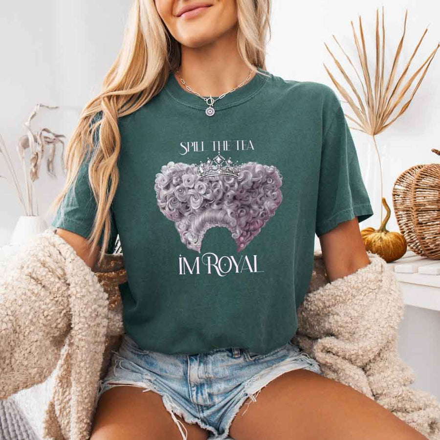 May include a person wearing a Blue Spruce Comfort Colors Spill the Tea I’m Royal T-Shirt featuring regency gossip inspired graphic and relaxed fit.